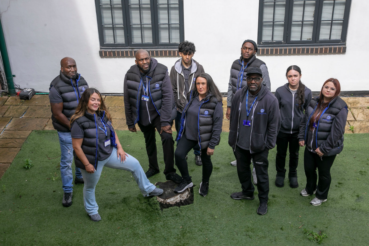 PUCIC team members standing together at the PUCIC premises